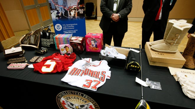 Holder cracking down on counterfeits online